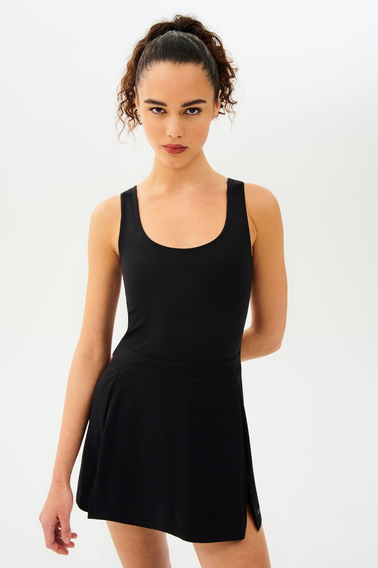 A woman is posing in a Splits59 Martina Rigor Dress - Black.
