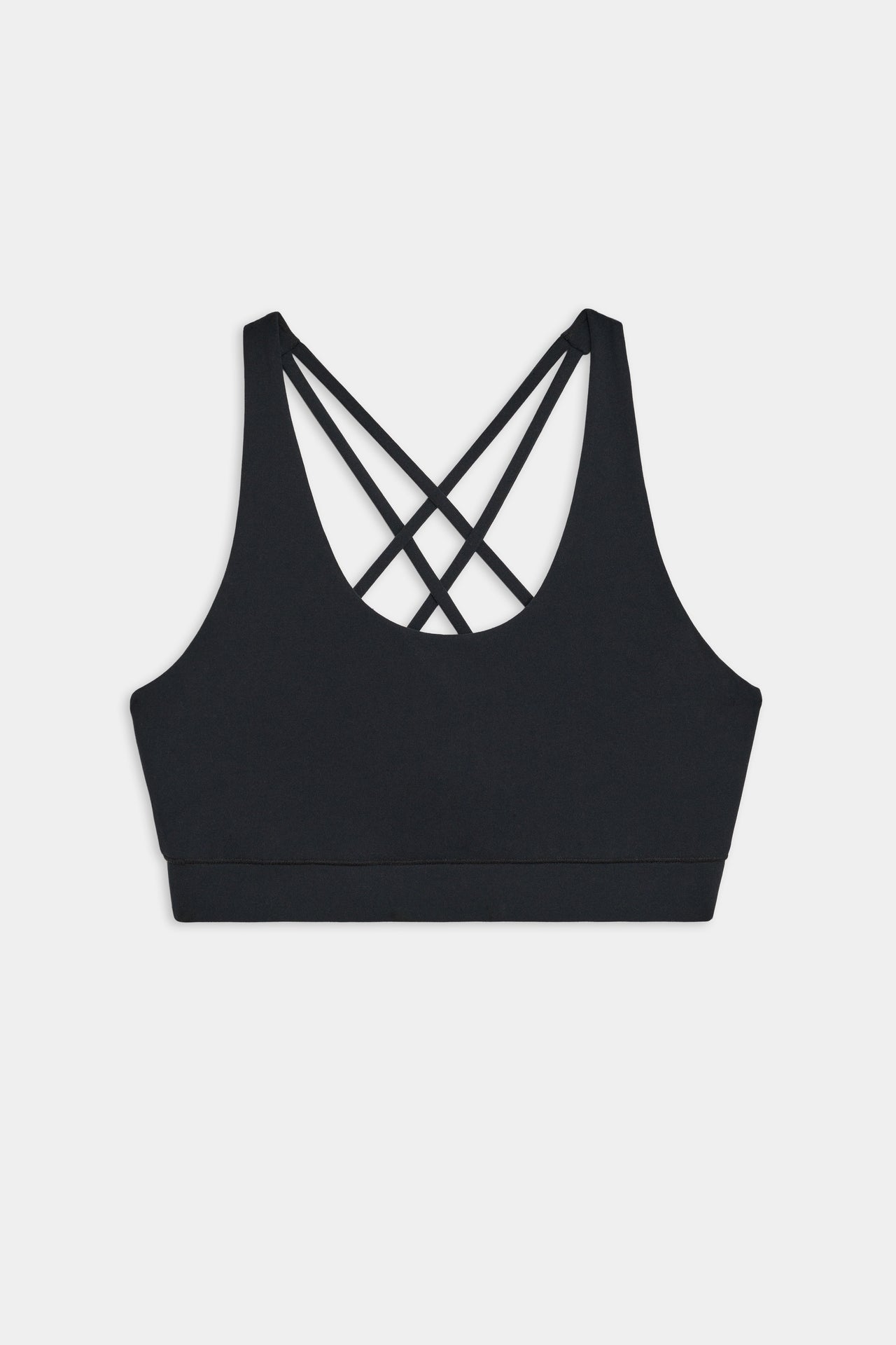 Flat view of black sports bra with thick straps and crisscrossed spaghetti straps