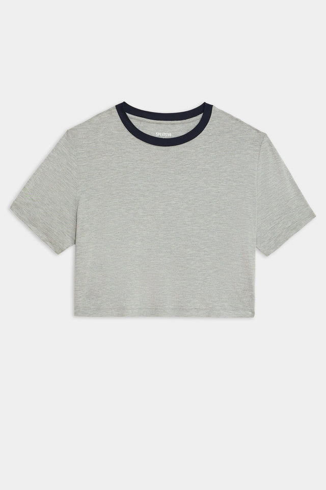 Flat view of  light grey cropped short sleeve t-shirt with thin dark blue neck hem 