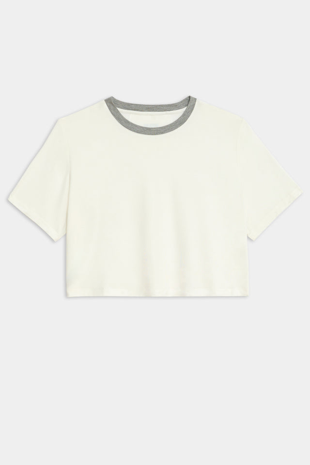 Flat view of white cropped short sleeve t-shirt with thin light grey neck hem 