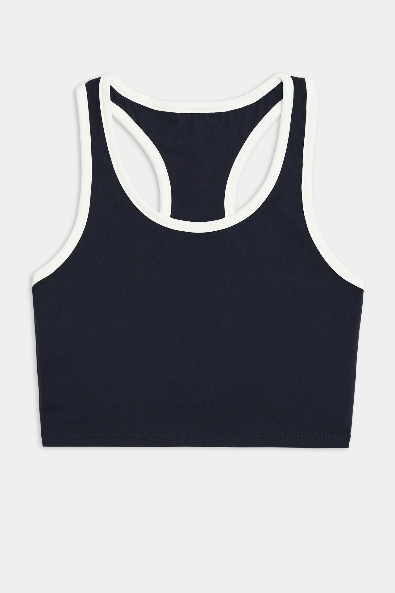 An Amber Airweight Bralette - Indigo/White by SPLITS59, featuring a racerback design, perfect for hot yoga. The super soft fabric provides ultimate comfort, shown against a white background.