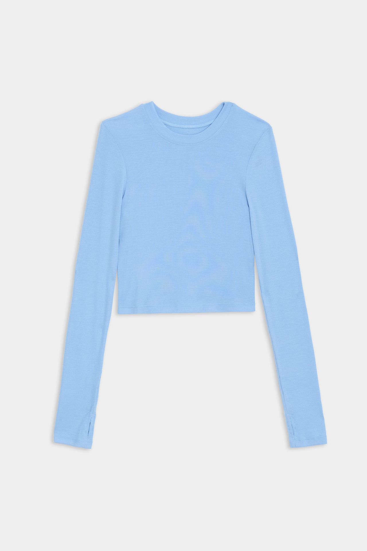 A light blue, long-sleeve, cropped shirt made from a soft modal fabric displayed on a white background: the Louise Rib Long Sleeve Crop - Skylight by SPLITS59.