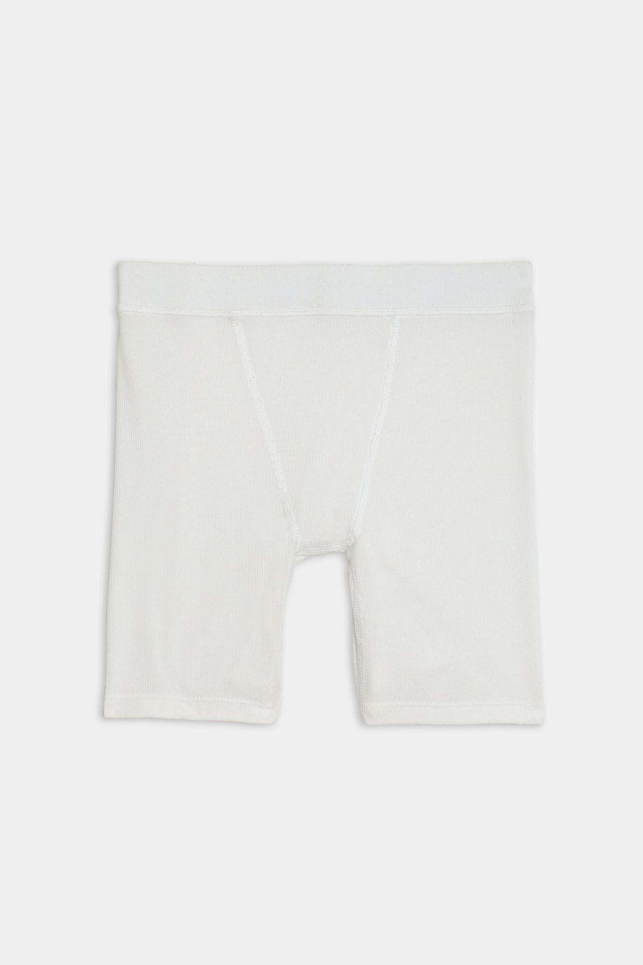 White, knee-length Theo Rib Short - White with a fitted design crafted from a blend of MODAL and SPANDEX fabric, featuring an elastic waistband, displayed against a plain background by SPLITS59.