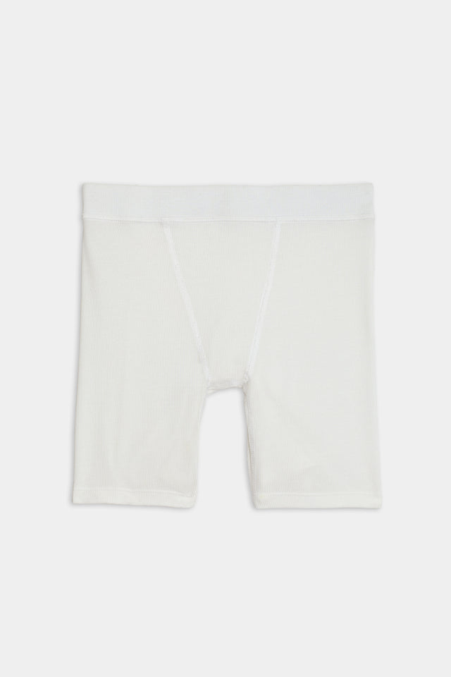 White, knee-length Theo Rib Short - White with a fitted design crafted from a blend of MODAL and SPANDEX fabric, featuring an elastic waistband, displayed against a plain background by SPLITS59.