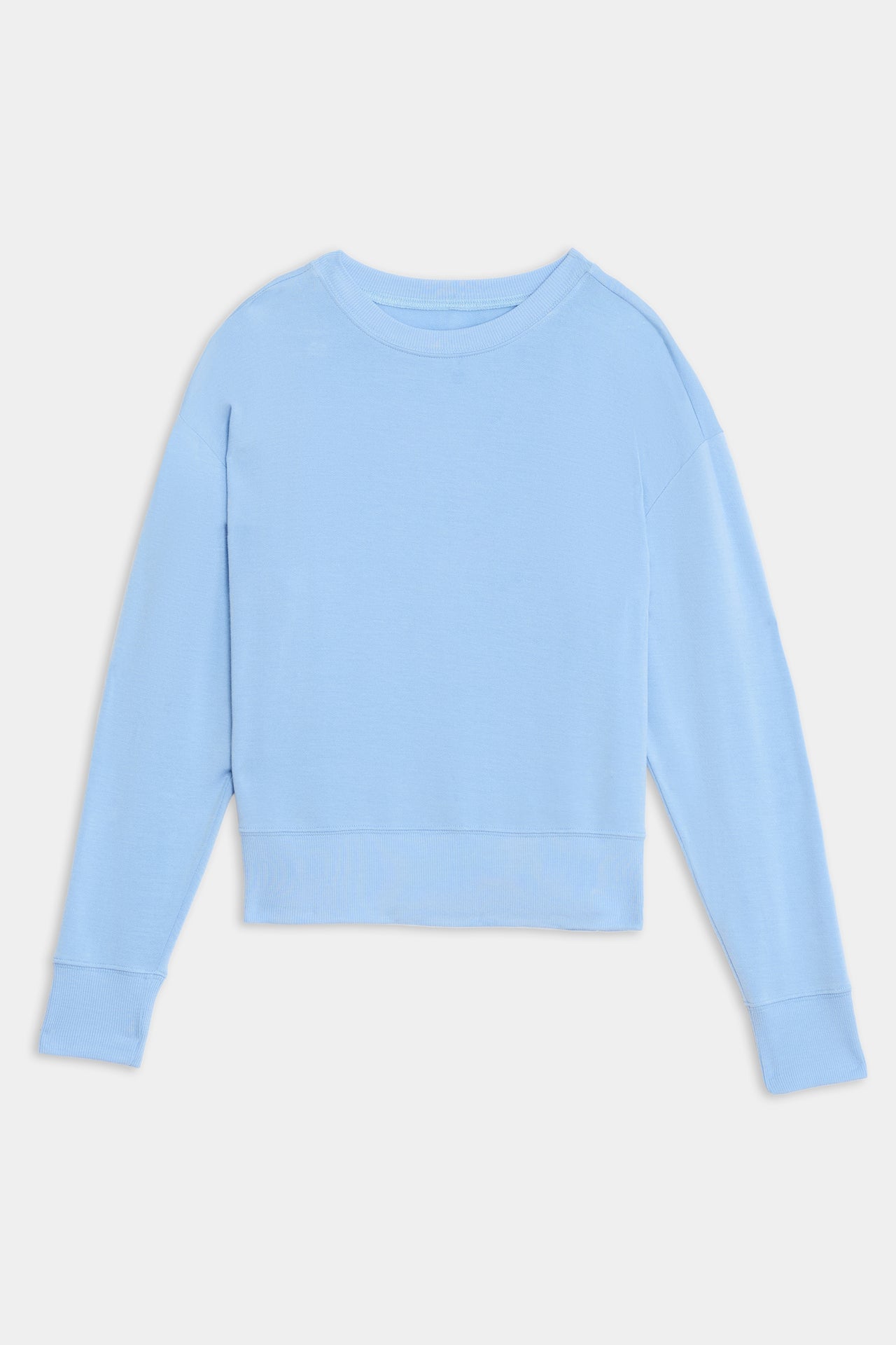 Light blue, long-sleeved, crew neck Sonja Fleece Sweatshirt - Skylight from SPLITS59 made from a cozy blend of modal fabric on a white background.