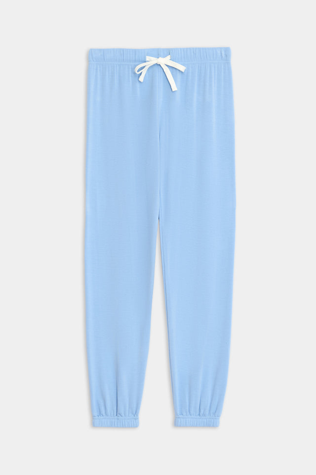 Light blue Sonja Fleece Sweatpant - Skylight from SPLITS59 with a white drawstring waist and elastic cuffs, crafted from a soft modal fabric blend with spandex for added comfort, displayed against a white background.