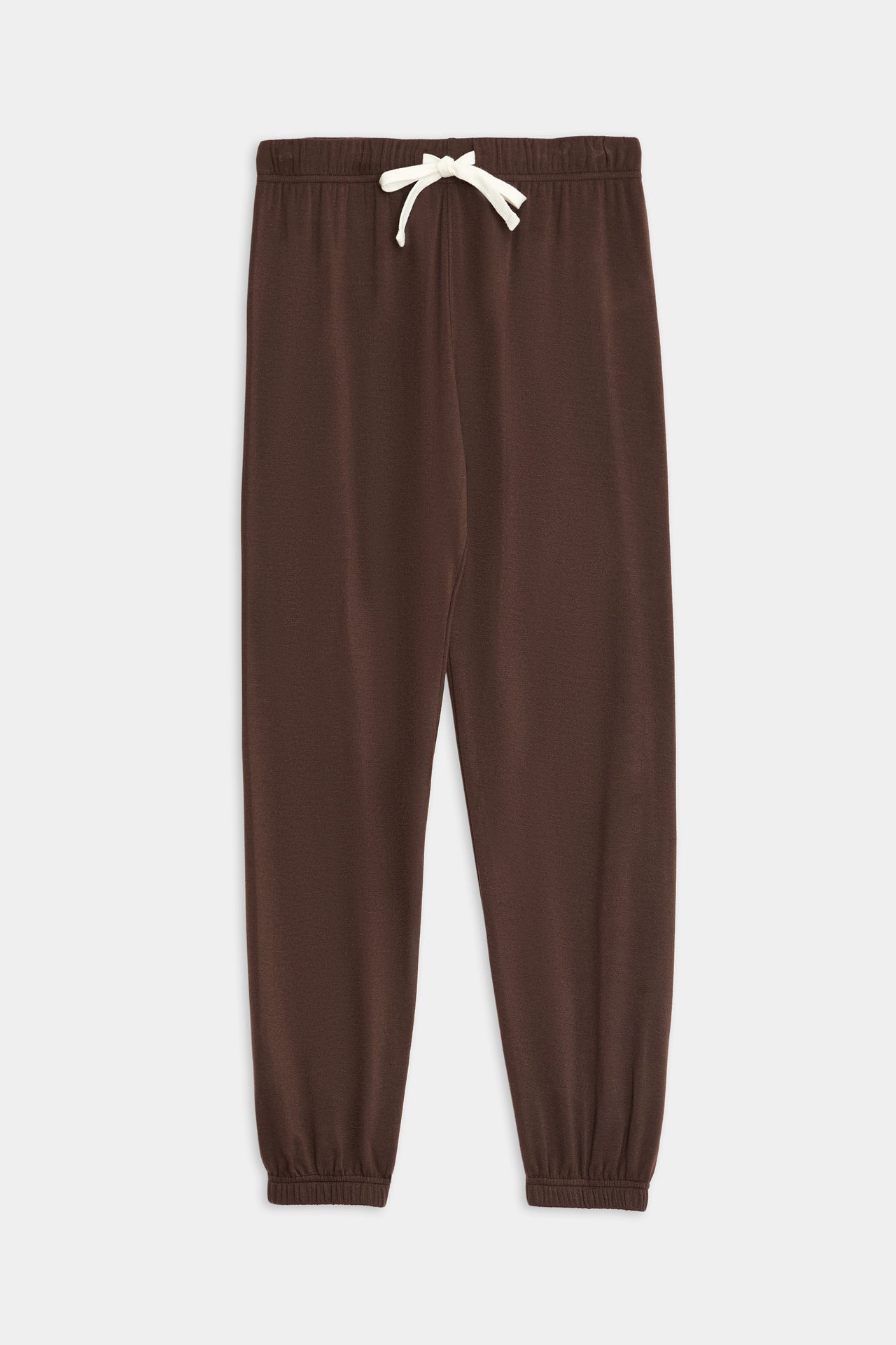 A pair of Sonja Fleece Sweatpant - Dark Chocolate by SPLITS59, made from a soft fabric blend, featuring an elastic waistband, white drawstring, and elastic cuffs.