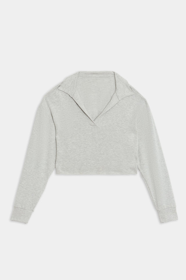 A SPLITS59 Joan Fleece Polo Sweatshirt - Heather Grey, made from soft modal fabric with a folded collar, lies flat on a white background.