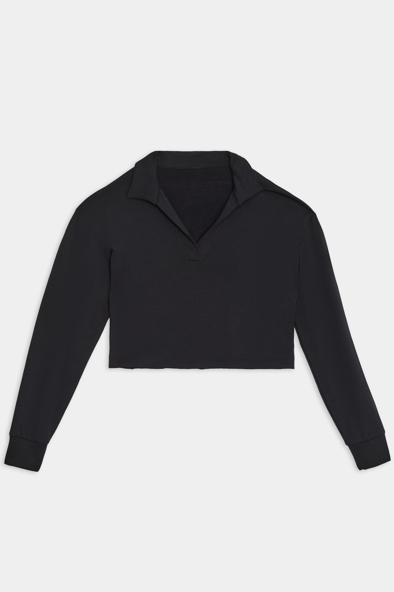 SPLITS59 Joan Fleece Polo Sweatshirt - Black, a long-sleeve crop top with a collar and deep V-neck design, crafted from a soft modal fabric, laid flat on a white background.