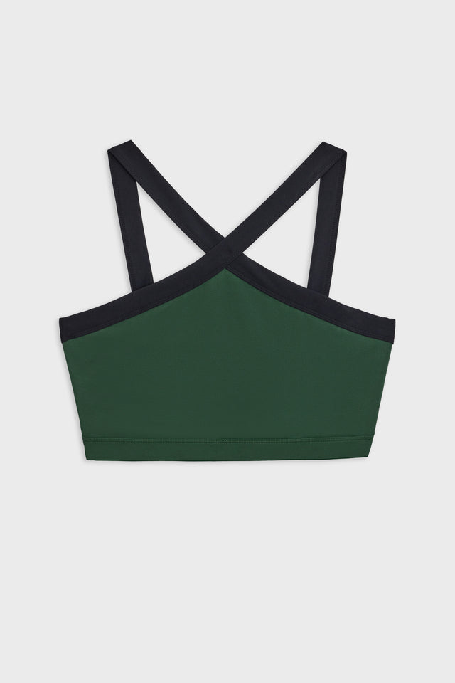 Front flat view of  dark green bra with thick black cross-front neckline straps 