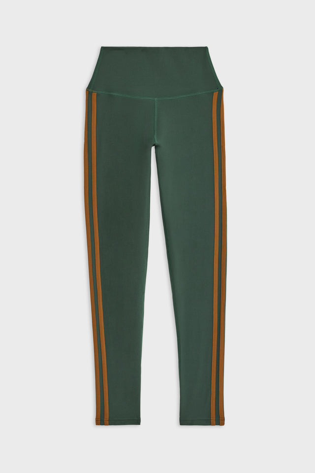 Flat view of dark green leggings with two brown stripes down the side