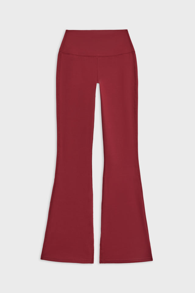 Front flat view of dark red high waist below ankle length legging with wide flared bottoms