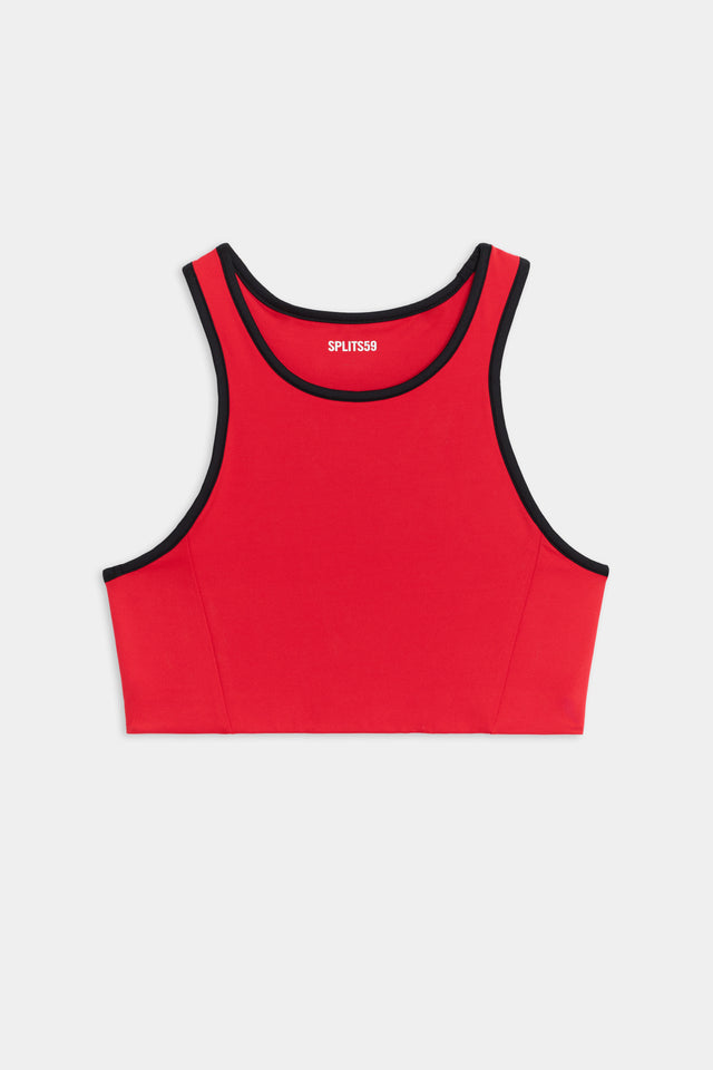 Flat view of red sports bra with black hem along the neck and arms