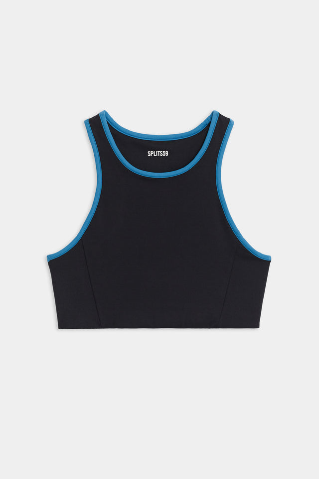 Flat view of black sports bra with blue hem around neck and arms