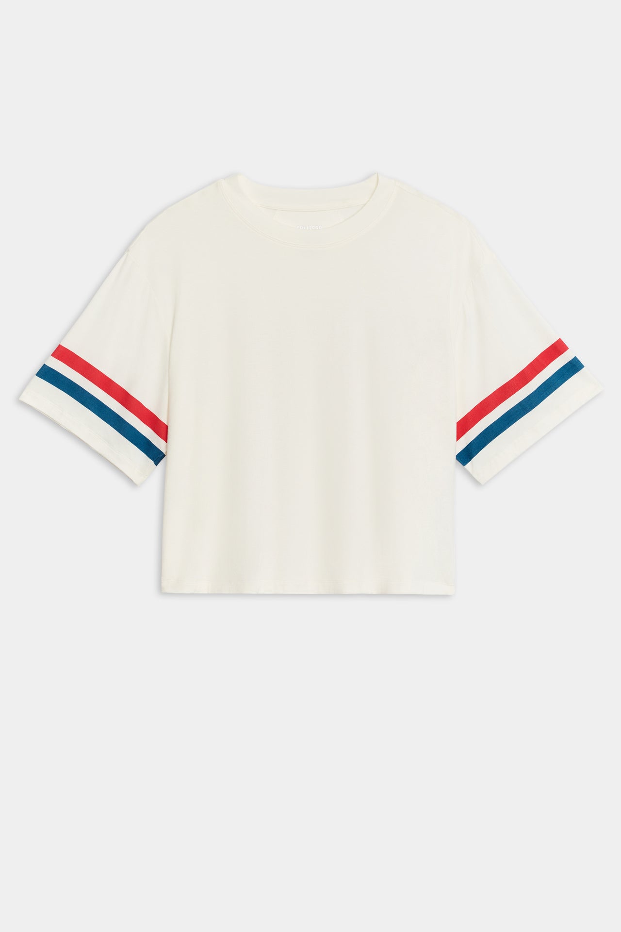 Flat view of a cropped short sleeve white shirt with red and blue stripes on the arm 