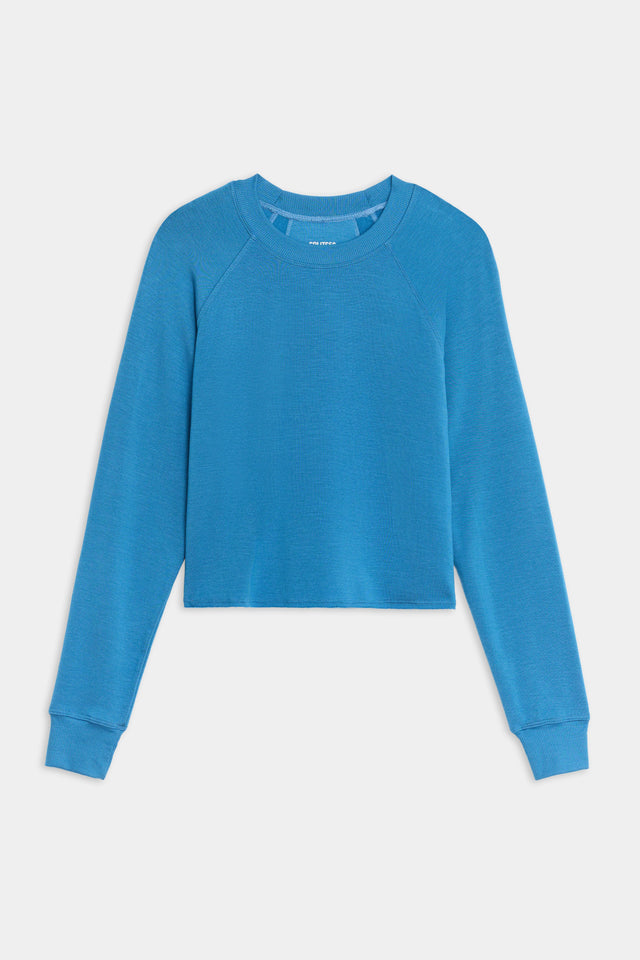 Front flat view of cropped  bright blue sweatshirt