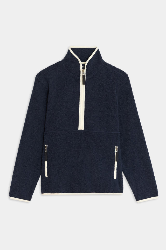 A children's Libby Sherpa Half Zip - Indigo/Creme fleece jacket with white zippers by SPLITS59.