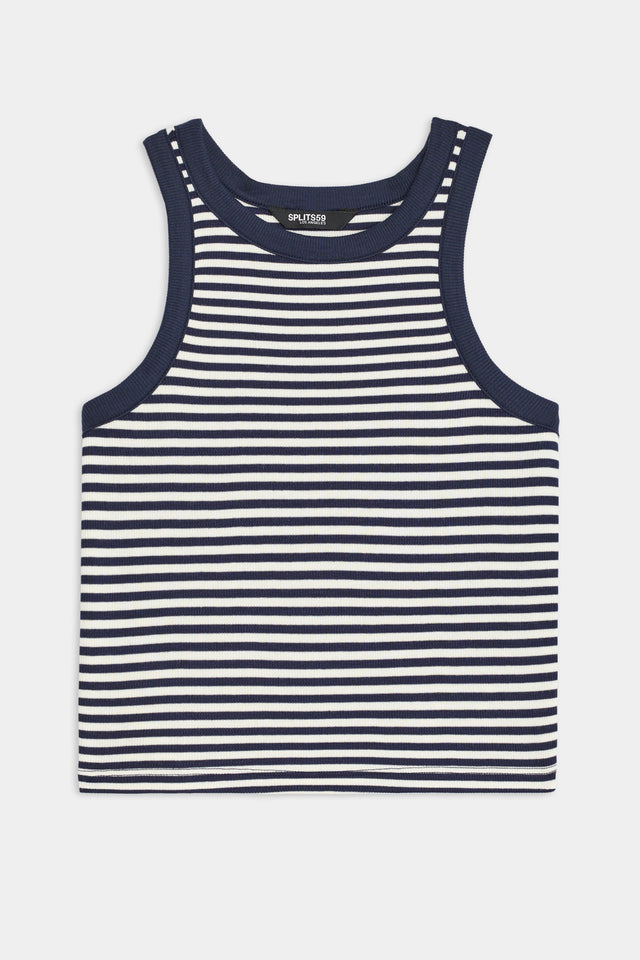 The Kiki Rib Crop Tank by SPLITS59 is a sleeveless cropped tank in white and indigo stripes, crafted from soft baby rib fabric. MADE IN LOS ANGELES.