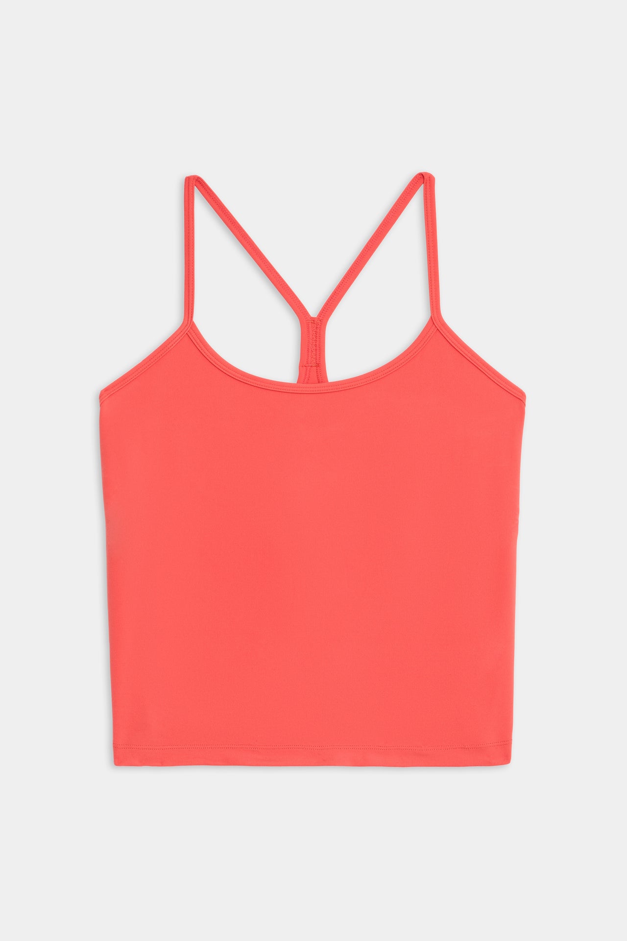 Airweight Tank sports bra in melon color by SPLITS59 isolated on white background.