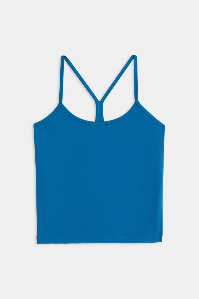 Airweight Tank - Stone Blue crop top with a racerback design on a white background by SPLITS59.