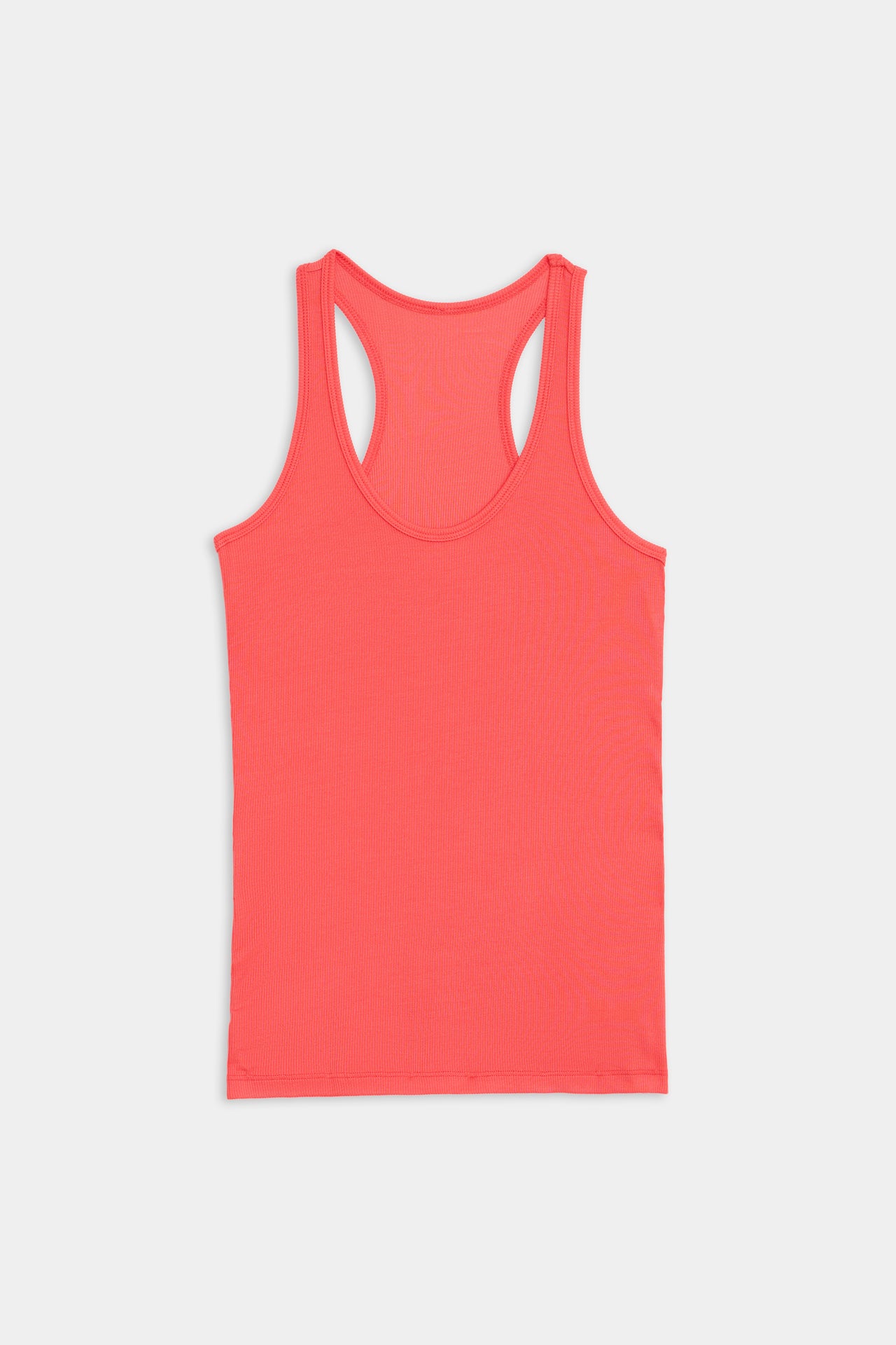 Bright orange sleeveless top from the SPLITS59 Ashby Trio Bundle displayed on a plain background.