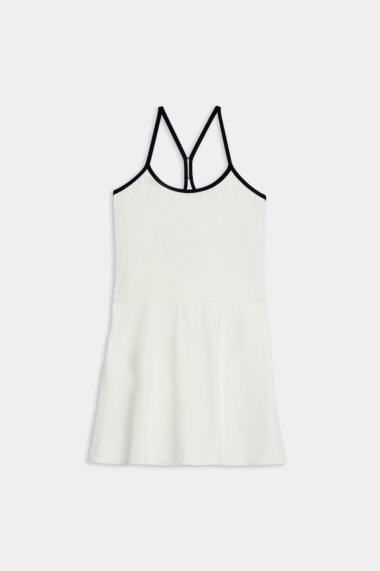 A sleeveless white nylon top with black trim on a plain background, reminiscent of the Simona Airweight Tank Dress - White/Indigo by SPLITS59.