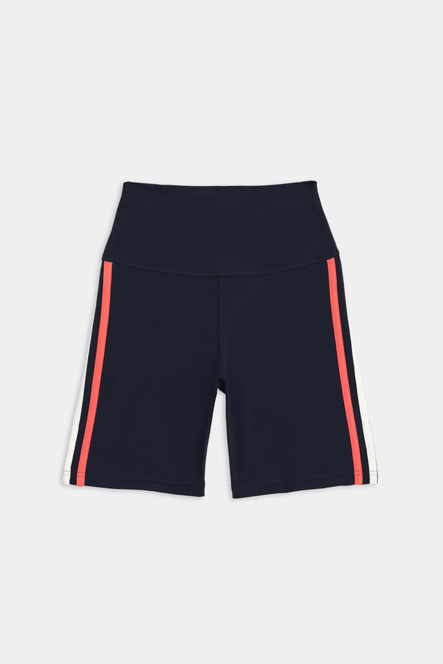 Ella High Waist Airweight Short in Indigo/Melon by SPLITS59 with red side stripes on a white background.