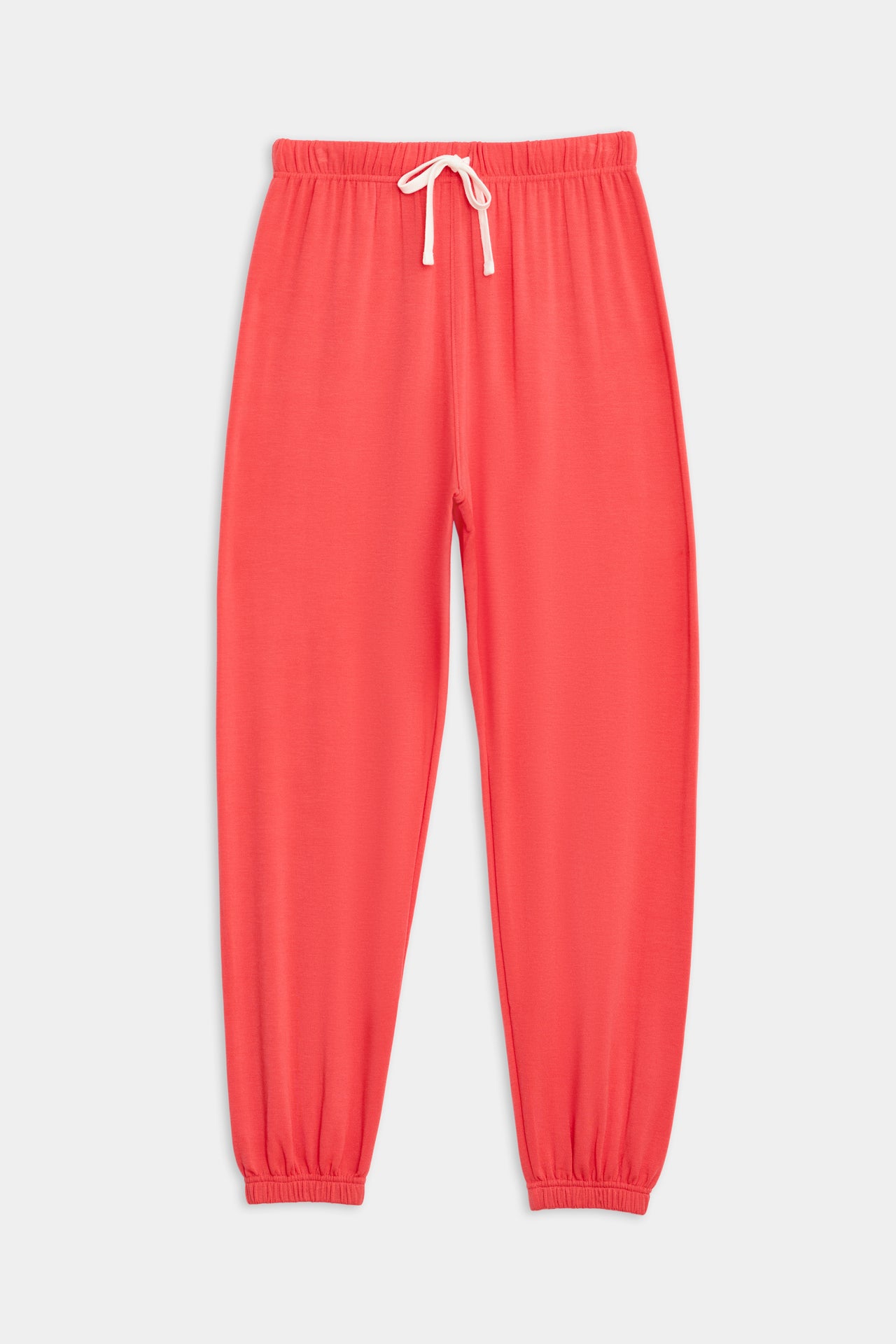 Bright red Andie Oversized Fleece Sweatpants with a drawstring waist and elastic cuffs, made from a comfortable fit modal spandex fabric blend by SPLITS59.