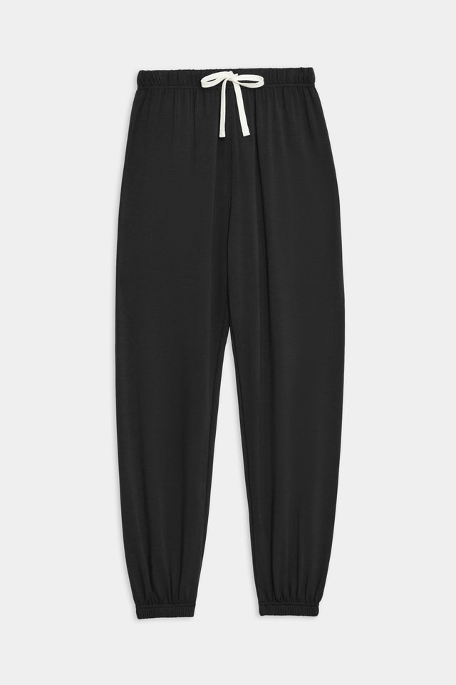 Andie Oversized Fleece Sweatpant in Black by SPLITS59 made of comfortable fabric on a white background.