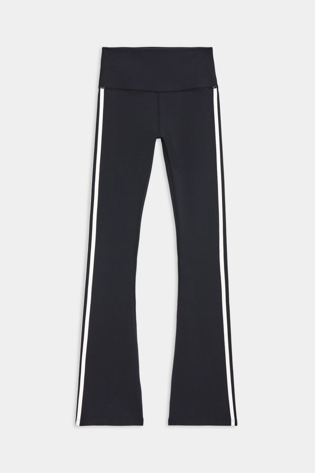 Front flat view of black high waist below ankle length legging with wide flared bottoms with double white side stripes on both legs