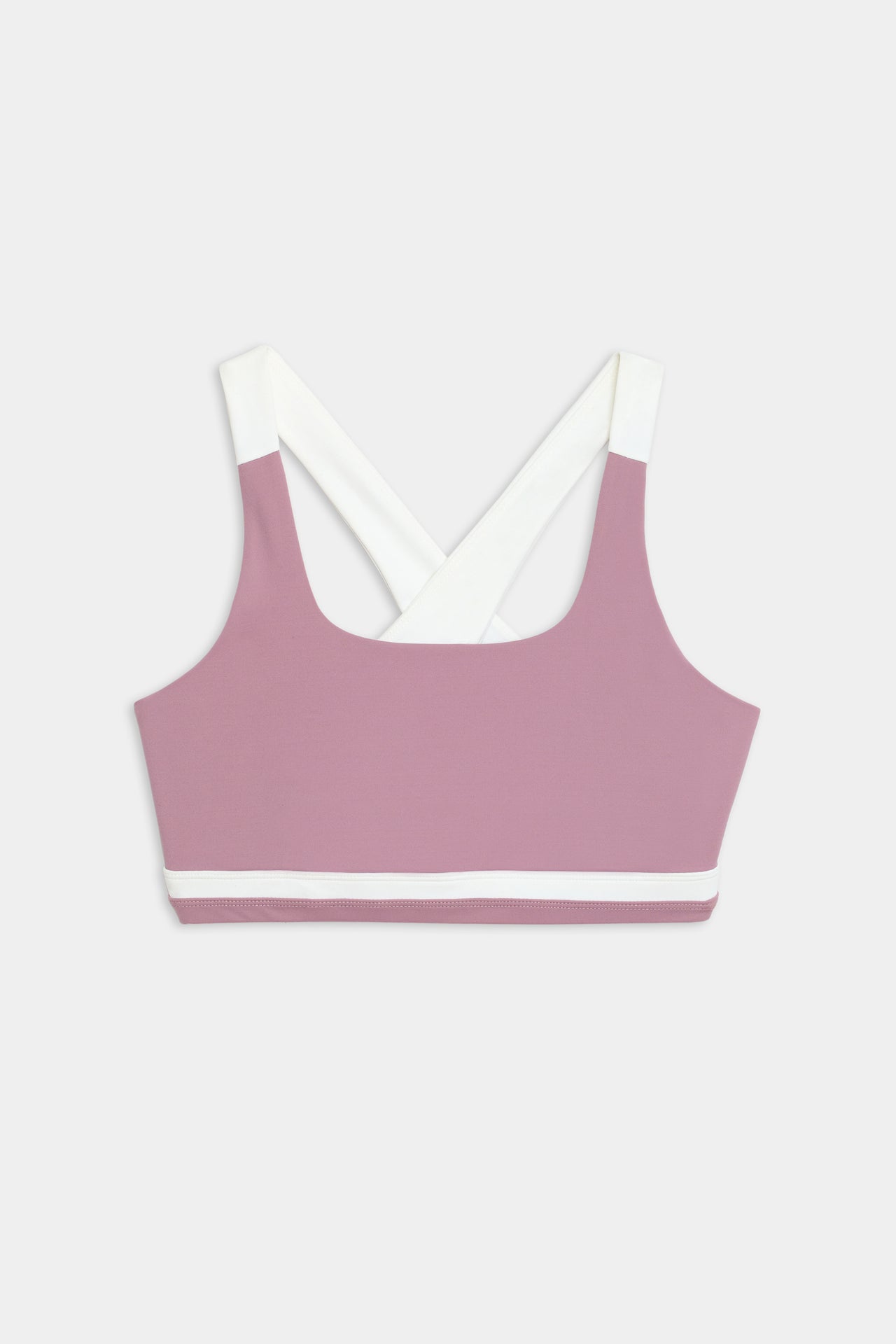 A pink and white Miles Rigor Bra - Blush/White sports bra top by SPLITS59, designed for stylish support during workouts, on a white background.