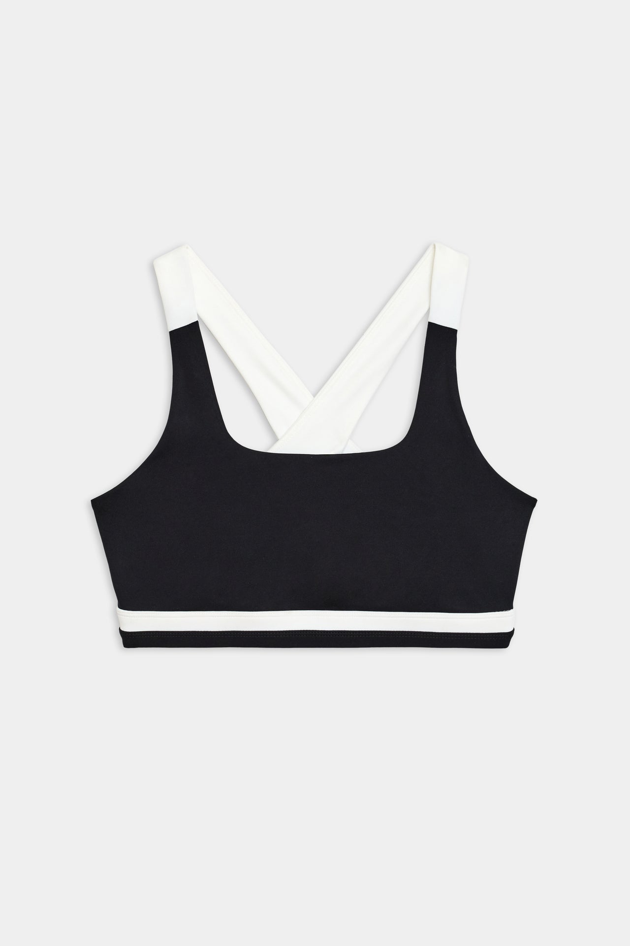 A stylish SPLITS59 Miles Rigor Bra - Black/White designed for workouts, offering exceptional support.
