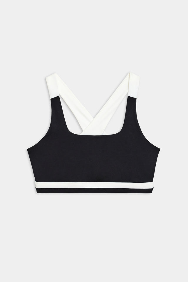 A stylish SPLITS59 Miles Rigor Bra - Black/White designed for workouts, offering exceptional support.