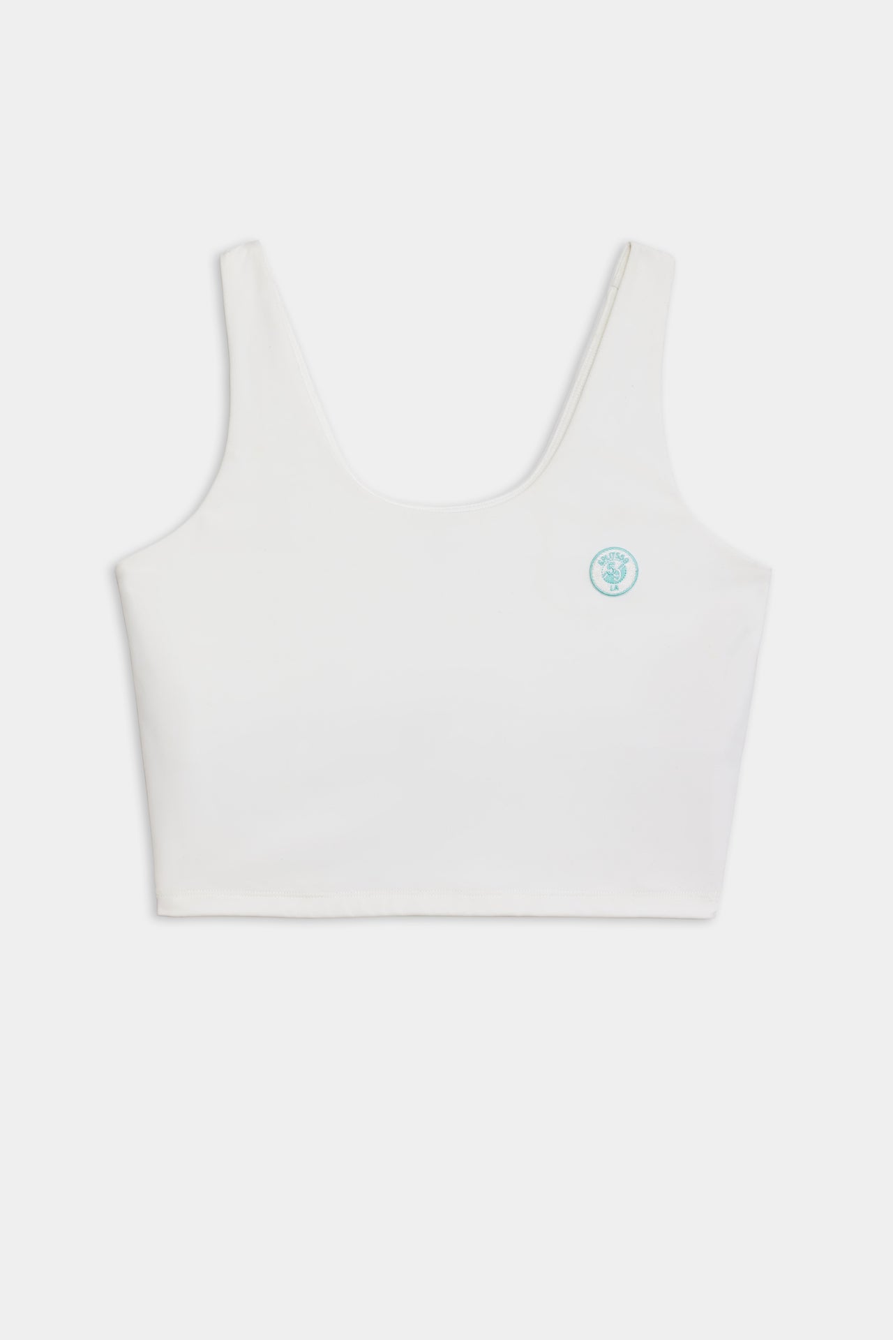 Front flat view of white tank bra with teal logo 