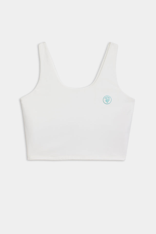 Front flat view of white tank bra with teal logo 