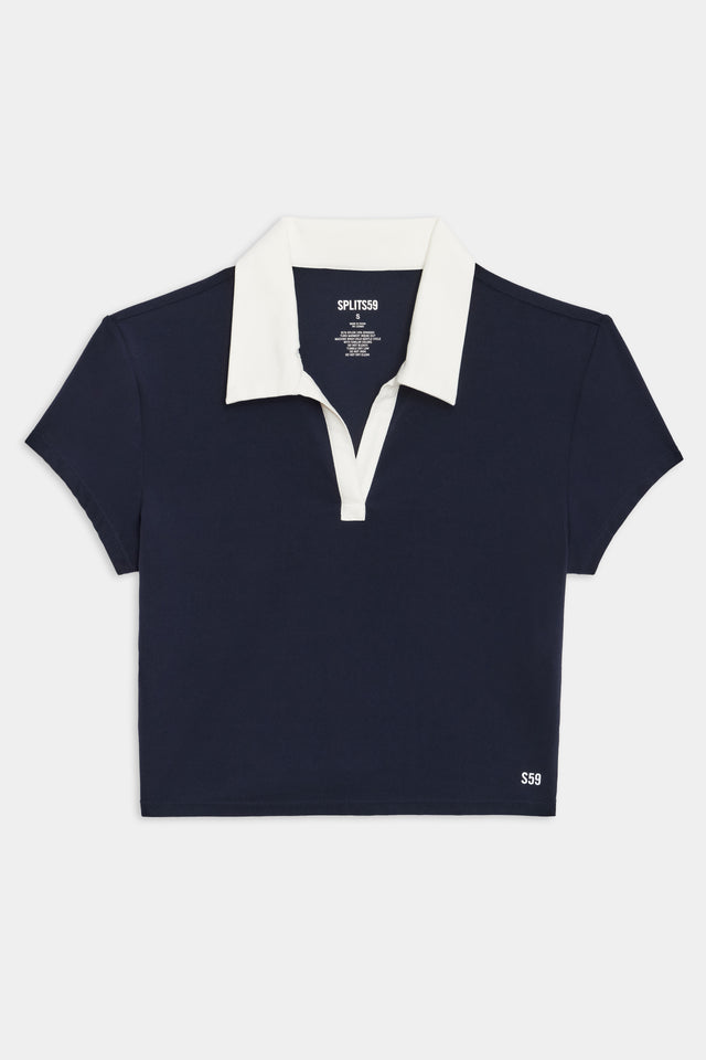 Flat view of cropped dark blue shirt with a white folded down collar