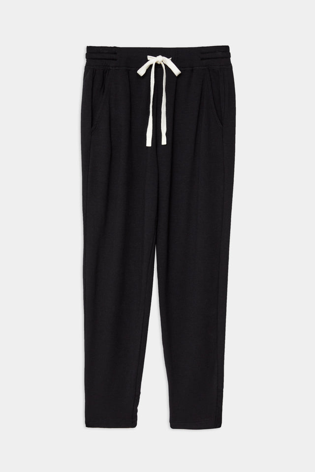 Front flat view of black sweatpant with tapered leg and above ankle length with white drawstring and side hip pockets