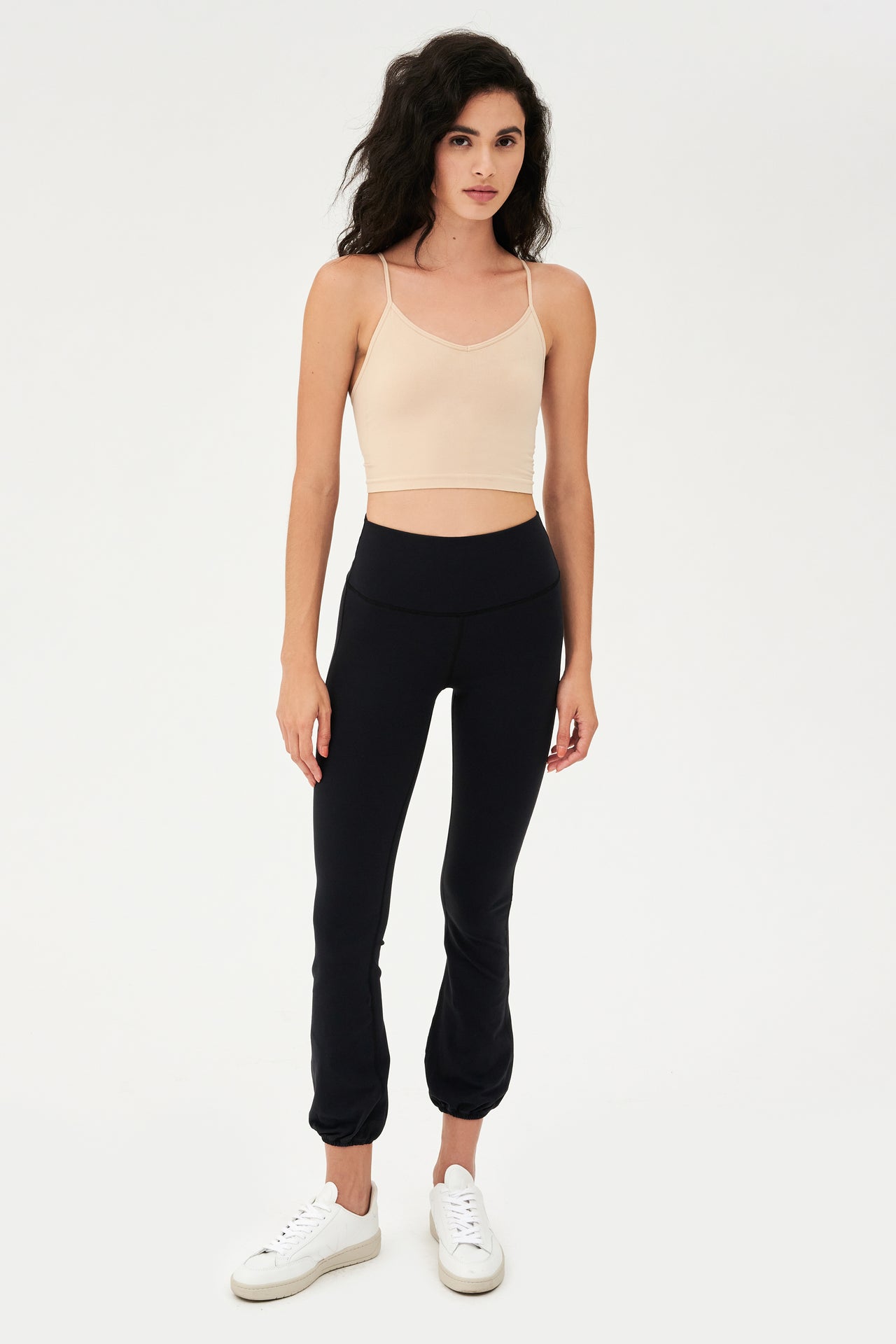 The model is wearing a black crop top and SPLITS59 Icon High Waist Supplex Legging - Black.