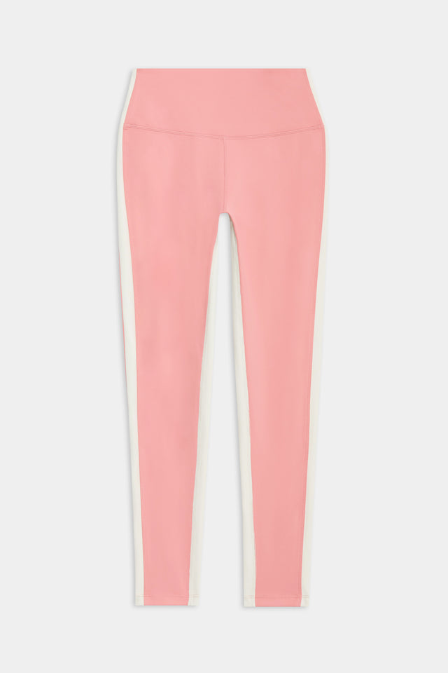 Flat view of light pink leggings with a white stripe down the side and inseam 